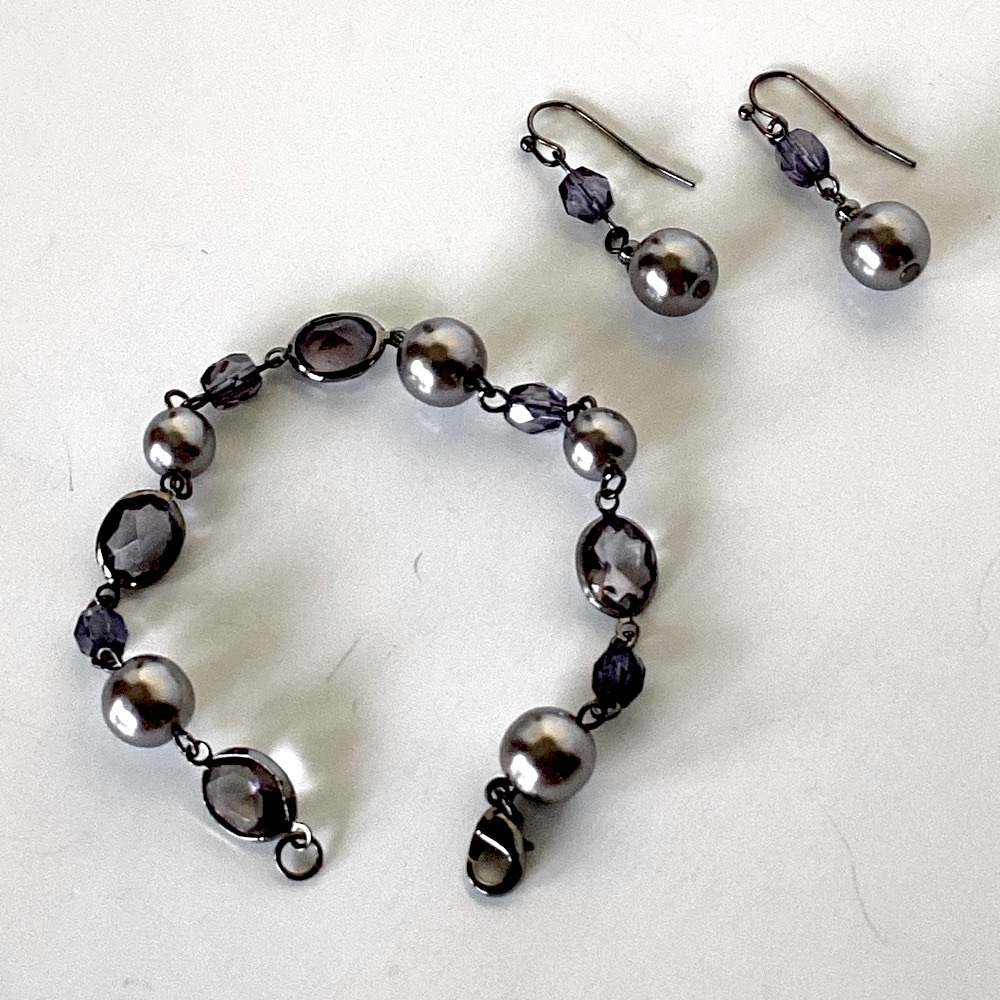 Crazy Horse Gunmetal Tone Gray Pearl And Purple Crystal Bracelet And Earrings